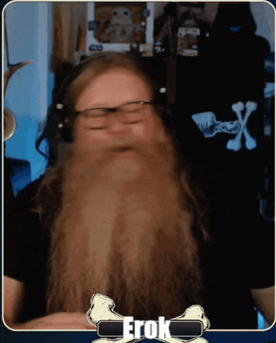 a man with a long beard is wearing headphones and has the word frok on the bottom