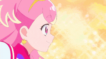 a girl with pink hair and a yellow star on her earring