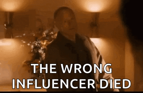 a man standing in a room with the words " the wrong influencer died " behind him