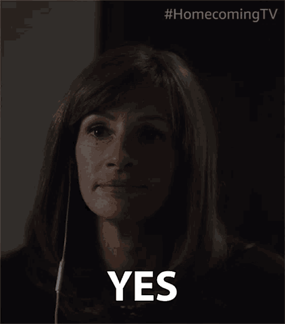a close up of a woman 's face with the word yes written on it