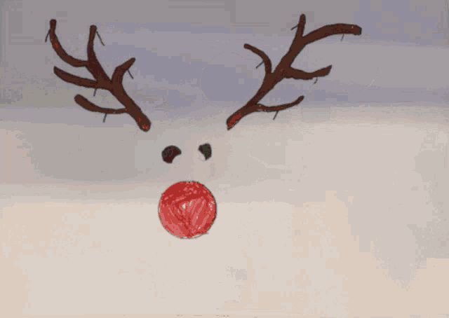 a child 's drawing of a reindeer with christmas ornaments