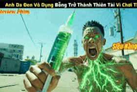 a man with green eyes is holding a syringe .