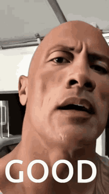 a close up of a man 's face with the word good written below it