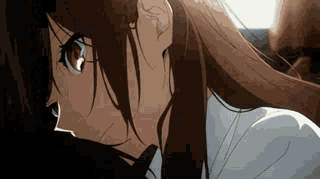 a close up of a girl 's face in a car with her eyes closed .