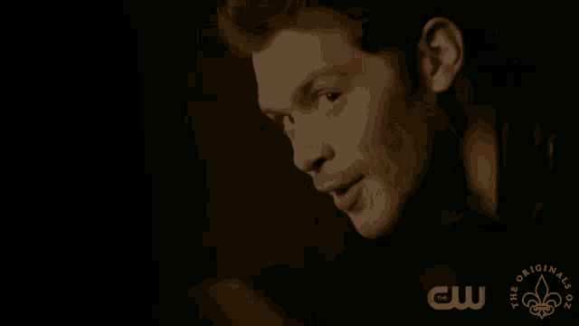 a close up of a man 's face with the words the originals on the bottom right
