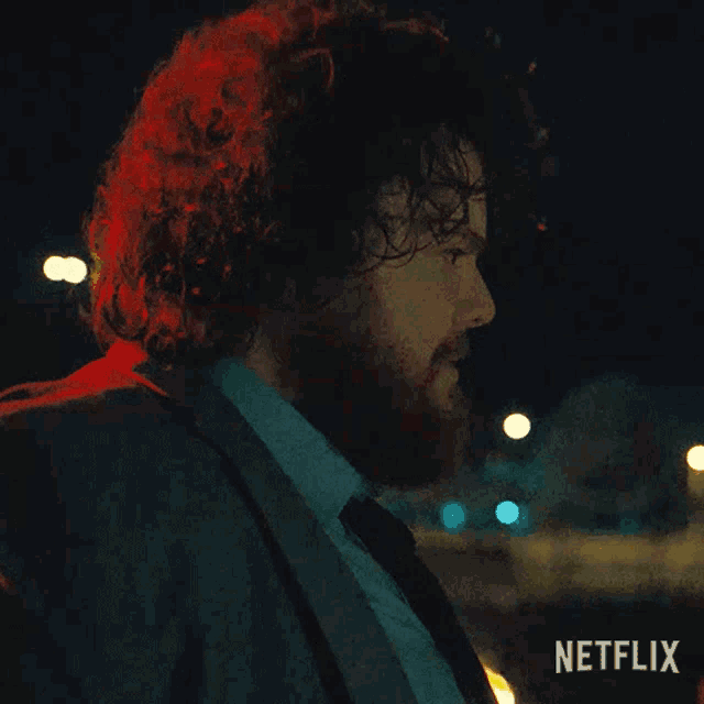 a man with curly hair and a beard says nice ride netflix