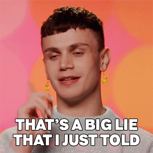 a young man wearing earrings says " that 's a big lie that i just told "