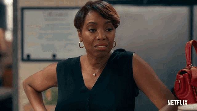 a woman with her hands on her hips and a netflix logo on the bottom