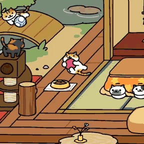 a calico cat laying on a wooden floor with a bowl of food next to it