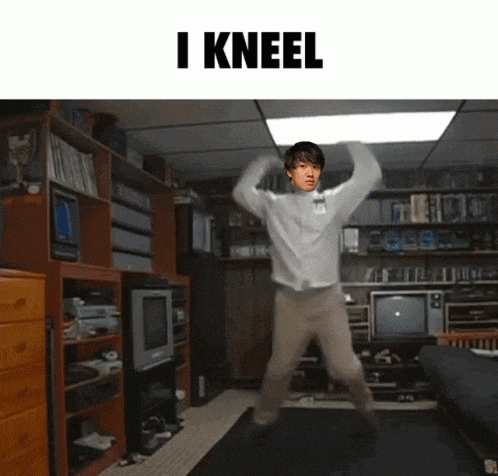 a man is dancing in a living room with the words i kneel behind him