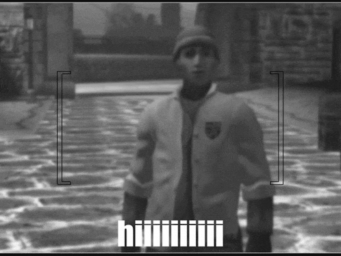 a black and white photo of a man with the word huiii visible