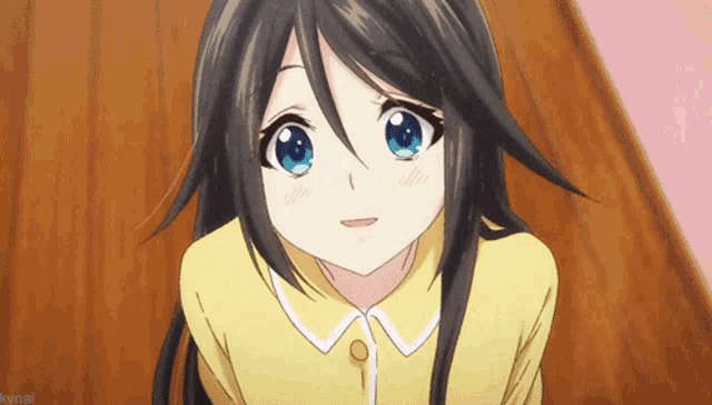 a girl with long black hair and blue eyes is wearing a yellow shirt and smiling