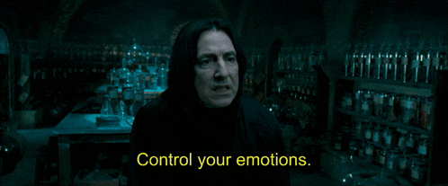 a man in a dark room with the words " control your emotions " behind him