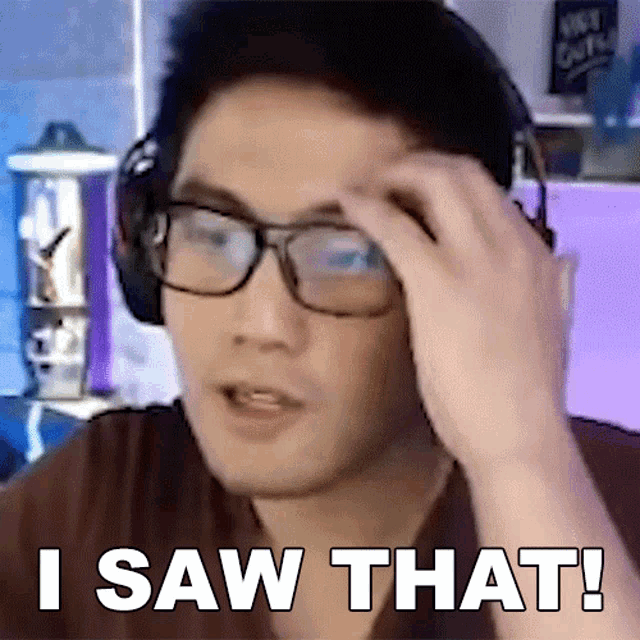 a man wearing glasses and headphones has the words i saw that written on his face