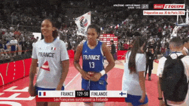 a basketball game between france and finlande is being played