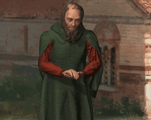 a man with a beard wears a green cape and red sleeves