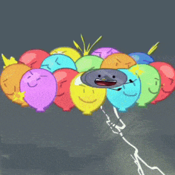 a bunch of balloons with faces on them are floating in the air