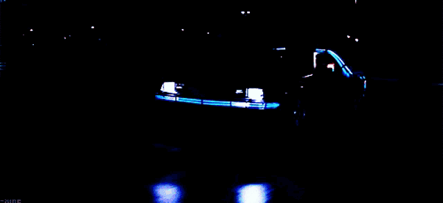 a back to the future car with a blue light coming out of the hood