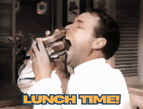 a man is eating a sandwich with the words lunch time written below him