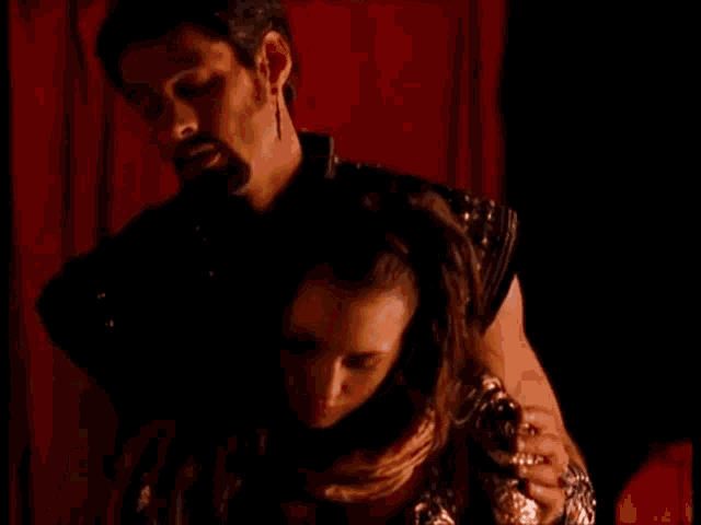 a man holding a woman with the words " you haven 't been there " in yellow