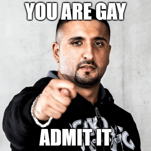 a man is pointing at the camera with the words you are gay admit it