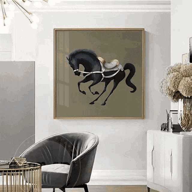 a painting of a black horse with a gold saddle is on a wall in a living room
