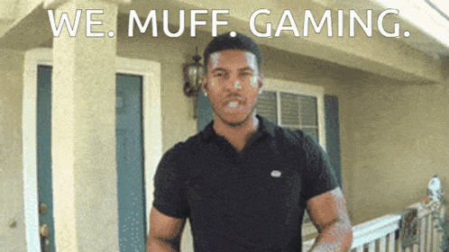 a man in a black shirt stands in front of a house with the words we muff gaming