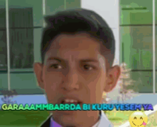 a man in a suit and tie is making a funny face with the words garaaaammbarda bi kuru yesemya behind him