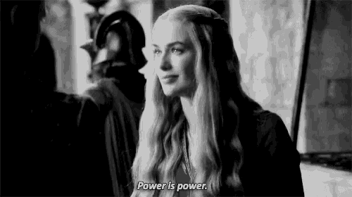 a black and white photo of a woman standing next to a man and saying `` power is power '' .