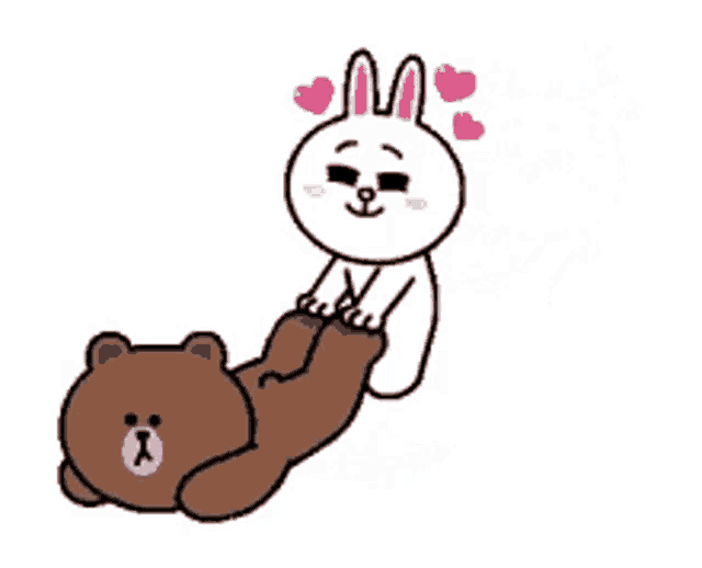 a brown bear and a white rabbit are laying on each other