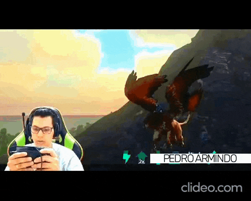 a man is playing a video game while wearing headphones .