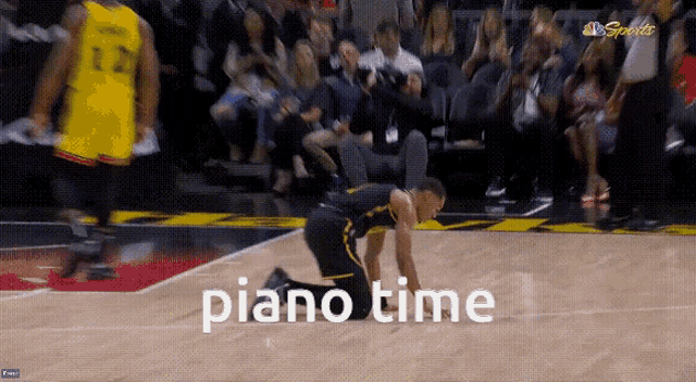 a basketball player is kneeling on the court with the word piano time written on the bottom