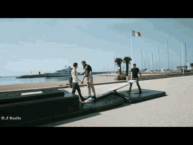 a group of people are walking down a sidewalk and the words dj smile are on the bottom