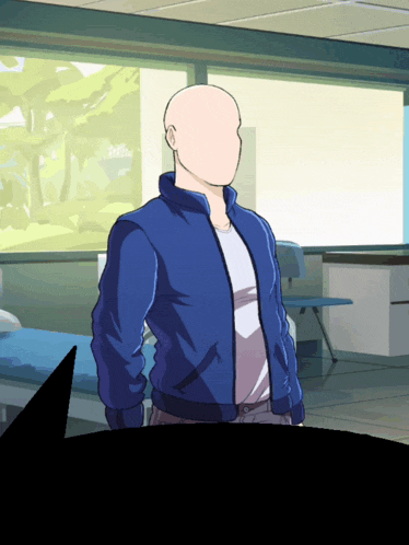 a bald man in a blue jacket is standing in a room
