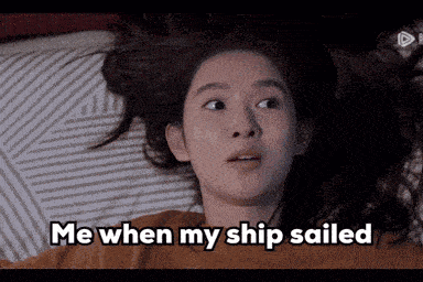 a woman laying on a bed with the words me when my ship sailed