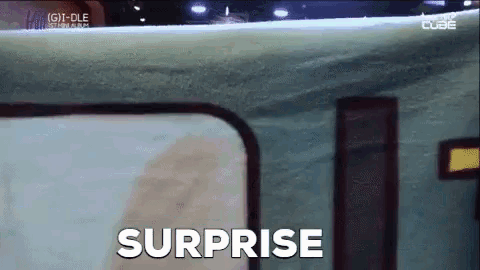 a train is going down the tracks and the words surprise are written on the screen