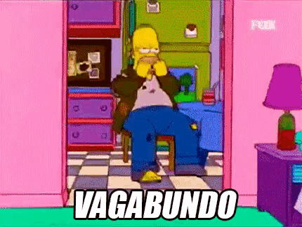 a cartoon of homer simpson sitting in a chair with the words vagabundo written above him