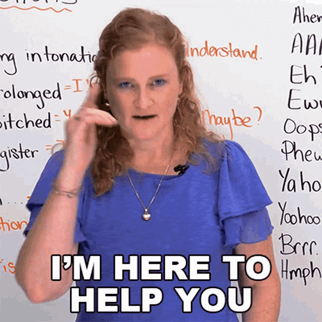 a woman stands in front of a white board and says i 'm here to help you