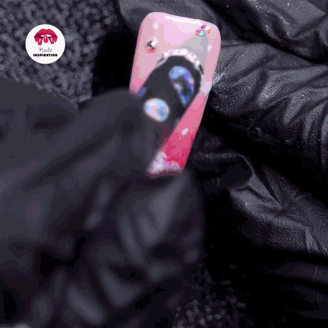 a close up of a woman 's nails with a lipstick that says ruby 's inspiration