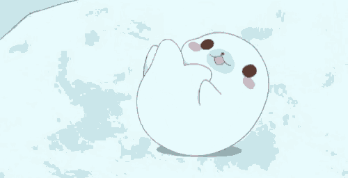 a cartoon seal is sitting on a piece of ice .