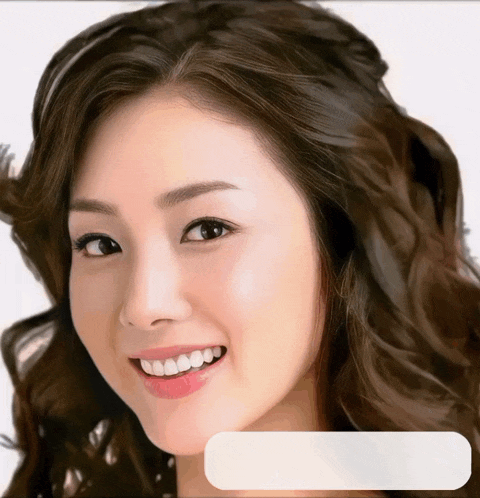 a close up of a woman 's face with her mouth open