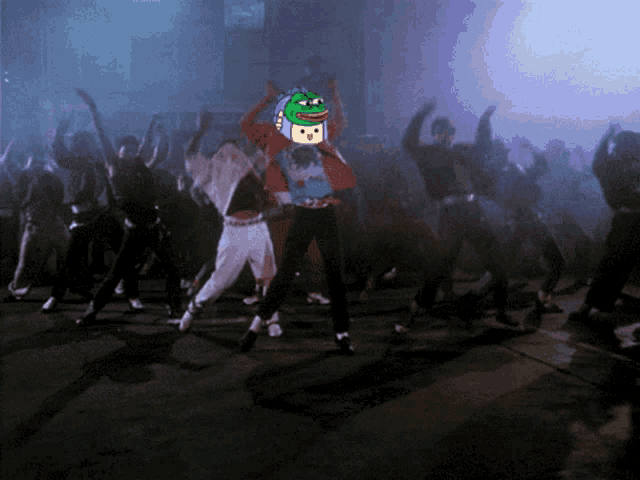 a group of people are dancing in a dark room and one of them is wearing a shirt that says ' i love you '