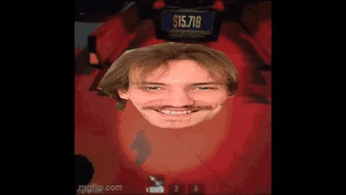 a man with a mustache is smiling in front of a car with a license plate that says $ 15,718