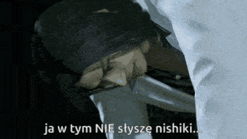 a man laying down with the words ja w tym nie szysze nishiki written below him