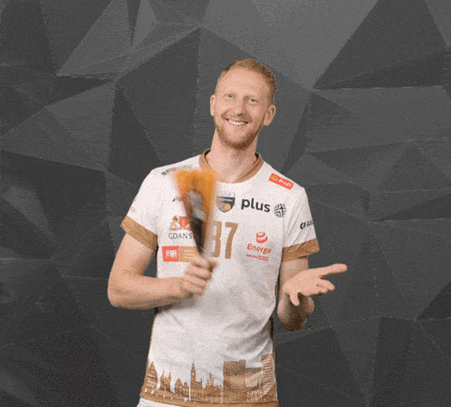 a man wearing a shirt with the number 87