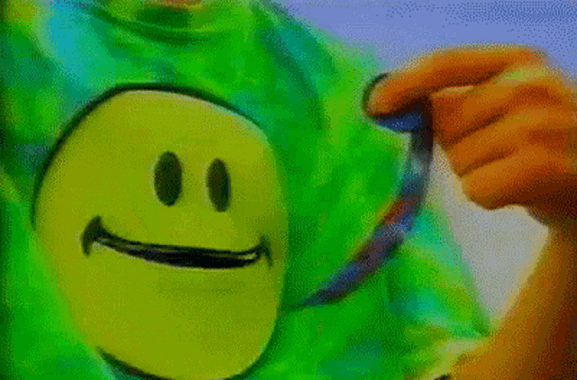 a close up of a person brushing their teeth with a smiley face in the background