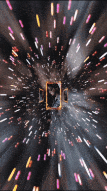a picture of a man in a frame is surrounded by glowing lights