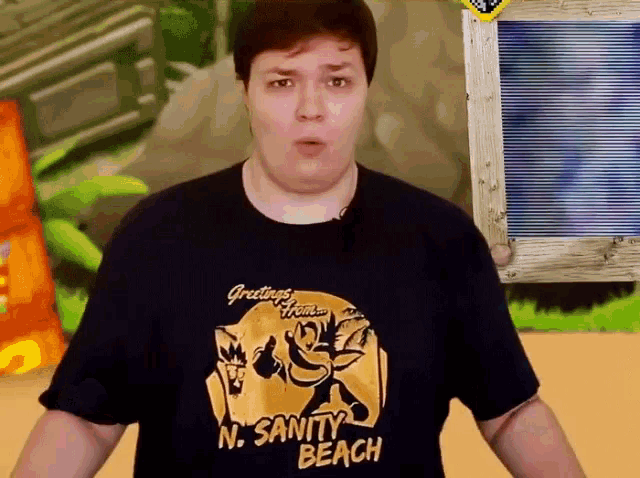 a man wearing a shirt that says greetings from n sanity beach