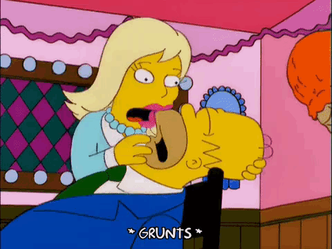 a cartoon of a woman holding homer simpson 's face with the words grunts written on the bottom