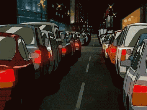 a bunch of cars are lined up on a street